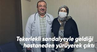 Tekerlekli sandalyeyle geldiği hastaneden yürüyerek çıktı