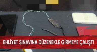 Ehliyet sınavına düzenekle girmeye çalıştı