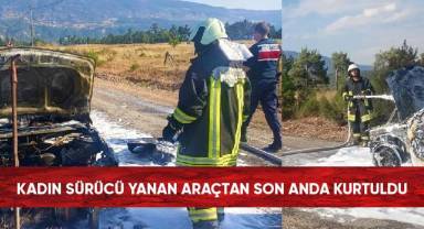 Kadın sürücü yanan araçtan son anda kurtuldu