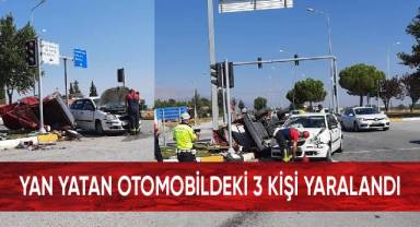 Yan yatan otomobildeki 3 kişi yaralandı