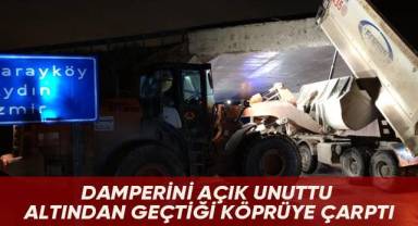 Damperi açık unutunca köprüye takılıp kaldı