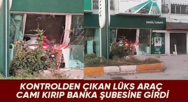Kontrolden çıkan lüks araç camı kırıp banka şubesine girdi