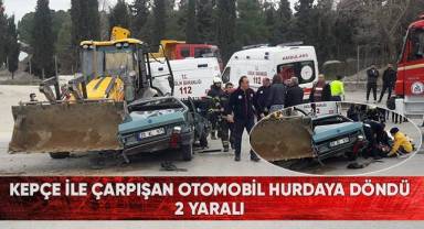 Kepçe ile çarpışan otomobil hurdaya döndü: 2 yaralı