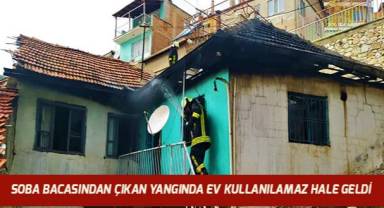 Soba bacasından çıkan yangında ev kullanılamaz hale geldi