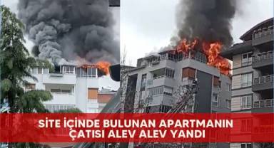Site içinde bulunan apartmanın çatısı alev alev yandı