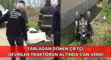Tarladan dönen çiftçi devrilen traktörün altında can verdi