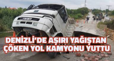Denizli'de aşırı yağıştan çöken yol, kamyonu yuttu