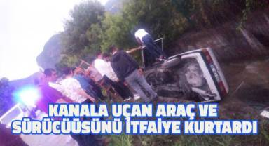 Kanala uçan araç ve sürücüsünü itfaiye kurtardı