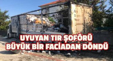 Şoförü uyuyan tır, evin bahçe duvarına çarpınca alev aldı