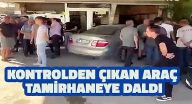 Kontrolden çıkan araç tamirhaneye daldı