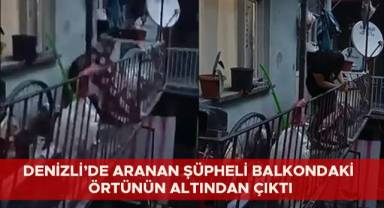 Denizli’de aranan şüpheli balkondaki örtünün altından çıktı