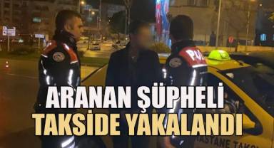 Aranan şüpheli takside yakalandı