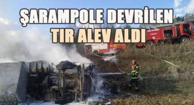 Şarampole devrilen tır alev aldı