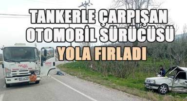 Tankerle çarpışan otomobil sürücüsü yola fırladı