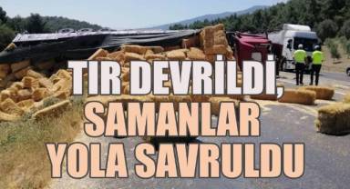 Tır devrildi, samanlar yola savrulunca, trafik aksadı