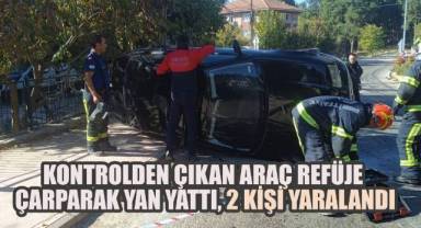 Kontrolden Çıkan Araç Refüje Çarparak Yan Yattı, 2 Kişi Yaralandı