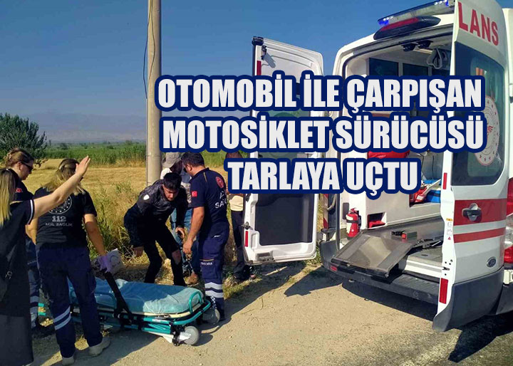 Otomobil ile çarpışan motosiklet sürücüsü tarlaya uçtu