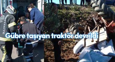 Gübre taşıyan traktör devrildi