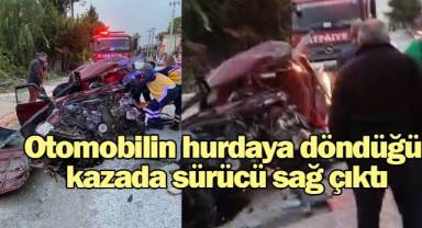 Otomobilin hurdaya döndüğü kazada sürücü sağ çıktı