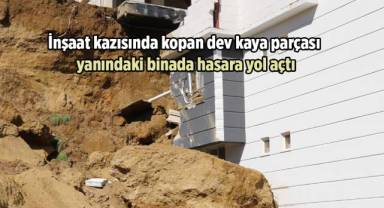 İnşaat kazısında kopan dev kaya parçası yanındaki binada hasara yol açtı