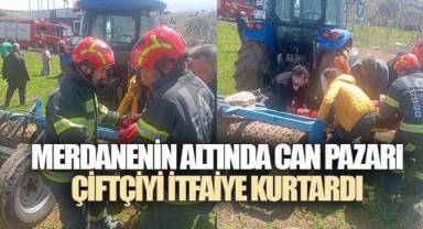 MERDANENİN ALTINDA CAN PAZARI: ÇİFTÇİYİ İTFAİYE KURTARDI