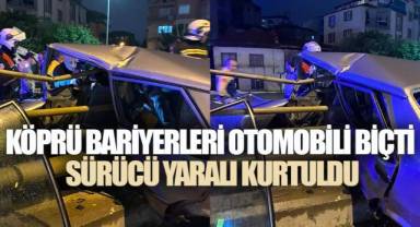 KÖPRÜ BARİYERLERİ OTOMOBİLİ BİÇTİ: SÜRÜCÜ YARALI KURTULDU