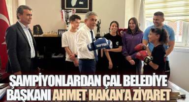 DÜNYA ŞAMPİYONLARINDAN ÇAL BELEDİYE BAŞKANI AHMET HAKAN'A ZİYARET